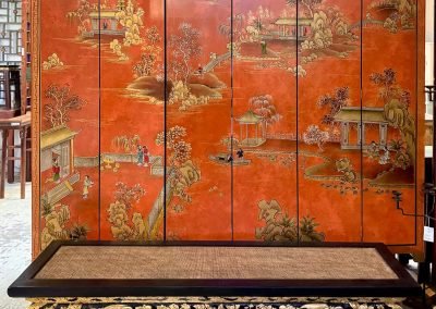 chinese hand-painted room-divider screens in red & gold, and a teochew carved bench below