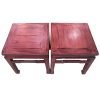 A pair of distressed pink Chinese square stools with hoof feet