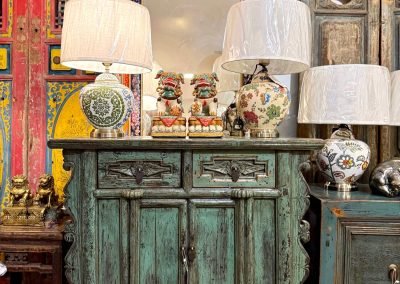 Chinese antique cabinet in distressed aqua with table lamps