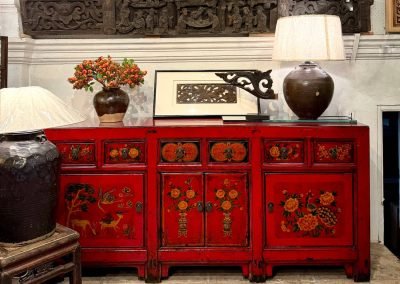 a long red glossy lacquered shanxi sideboard with painting