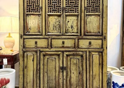 Antique chinese kitchen cabinet repainted in a distressed loght grey yellow